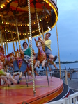 FZ005467 Lib and Jenni on carousel in Cardiff Bay.jpg